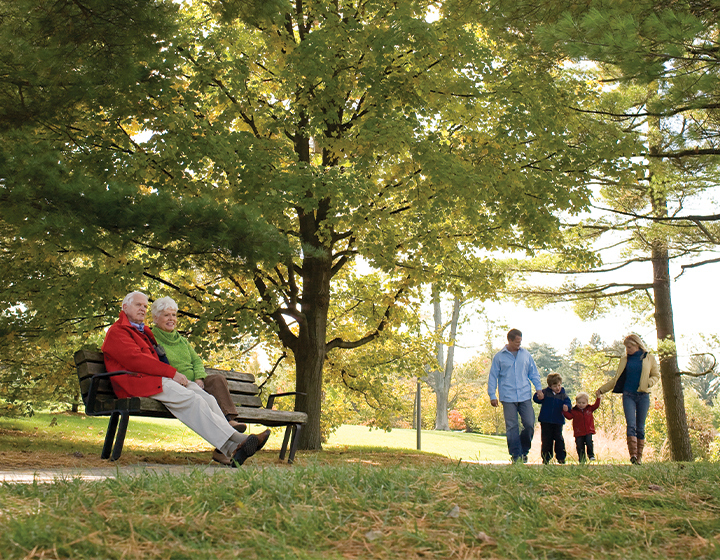 Families enjoy walking around Meadow Lake in Fall