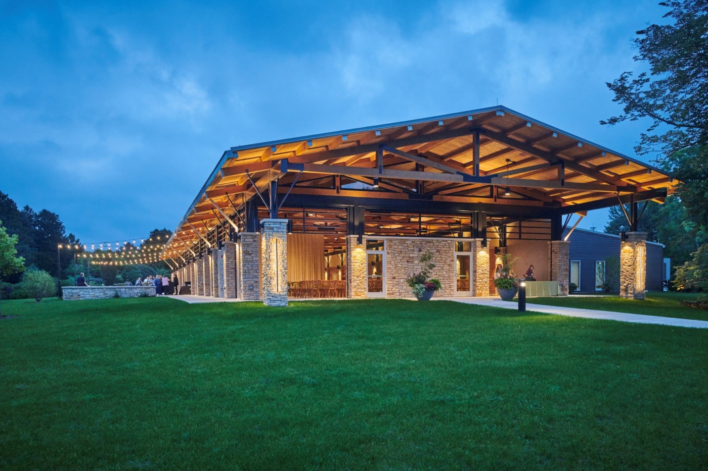 Firefly Pavilion lit up at night for a wedding
