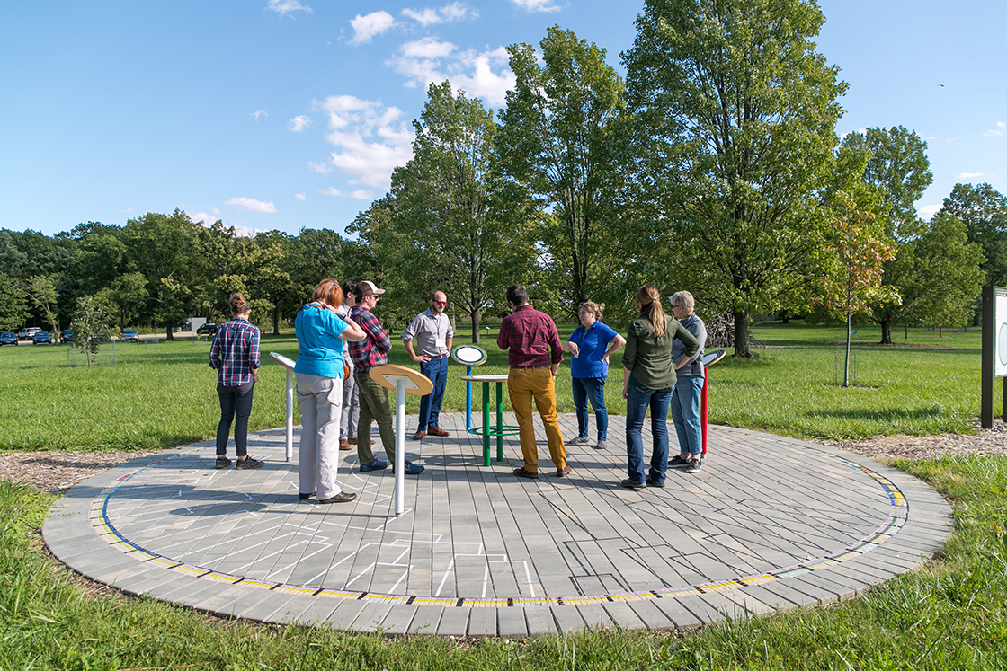 Group at the Gateway to Tree Science Tree of Life patio in Summer
