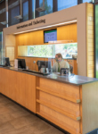 Staff working at information and ticketing desk