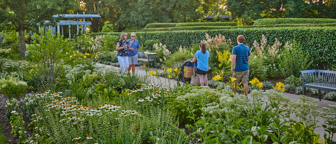 Guests enjoy spending time in the Grand Garden as the sun begins to set.