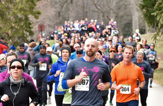 Guests running the Champion of Trees 10K race